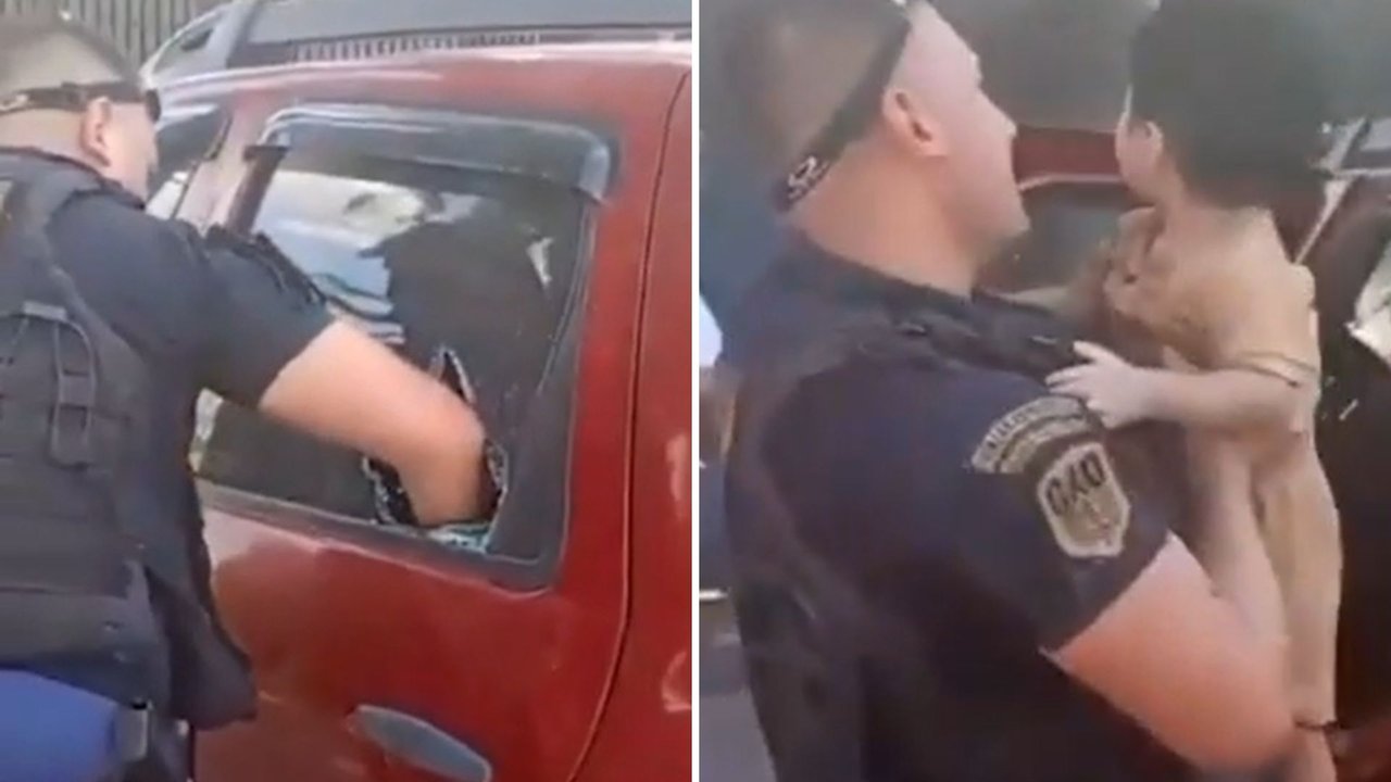 Patrullero policial en un estacionamiento de shopping
