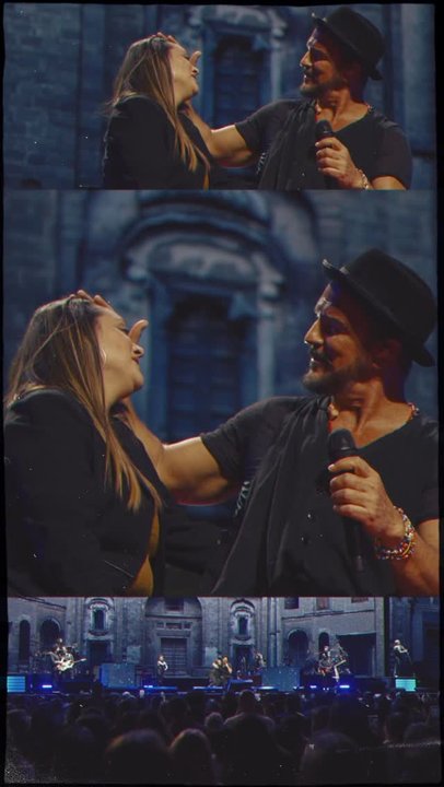 Ricardo Arjona junto a la fanática que trabajaba como seguridad en el show
