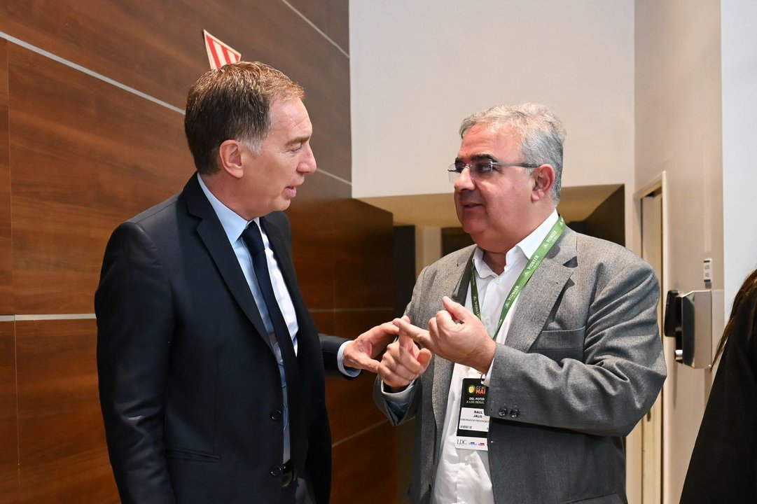 Diego Santilli y Raúl Jalil en una reunión de trabajo